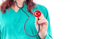 Turkey national healthcare system female doctor with stethoscope