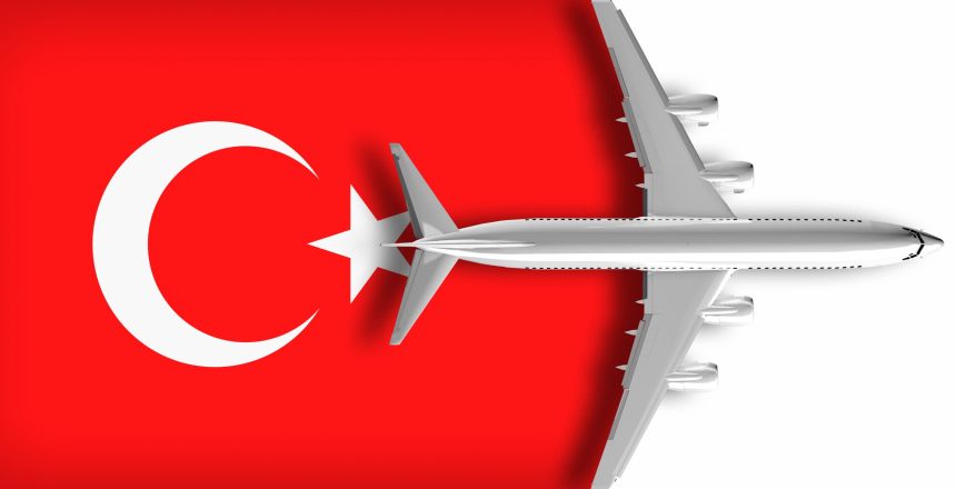 3D flag of Turkey with an airplane flying over it